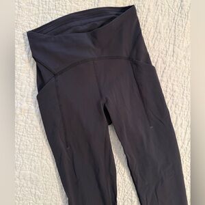 Lululemon black leggings size 4